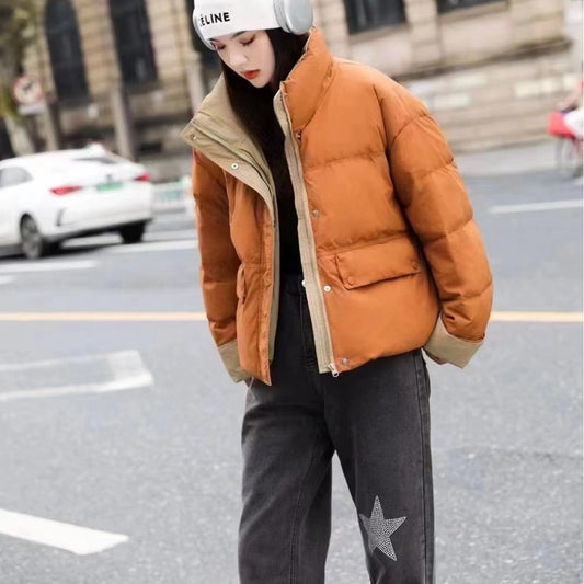 2023 winter new female Korean version fashion contrasting colors turned sleeves white duck down bread down jacket loose small people go out tide