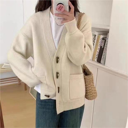 XIEYINSHE Korean version V-neck horn buckle knitted cardigan top New autumn and winter new soft waxy loose outer sweater women's coat