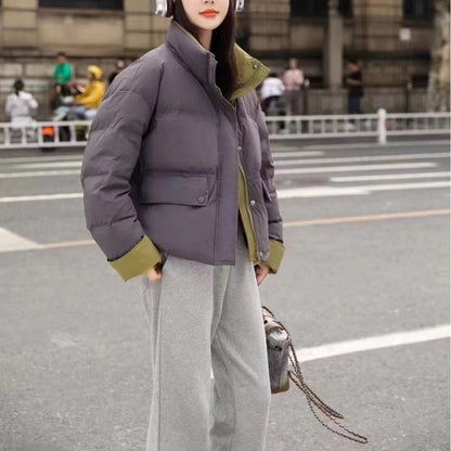 2023 winter new female Korean version fashion contrasting colors turned sleeves white duck down bread down jacket loose small people go out tide