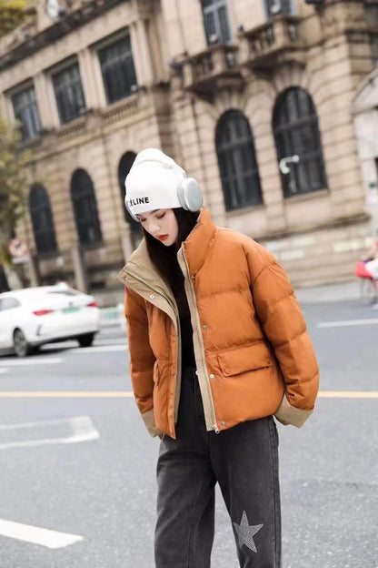 2023 winter new female Korean version fashion contrasting colors turned sleeves white duck down bread down jacket loose small people go out tide